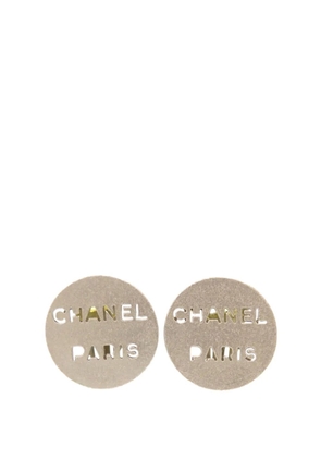 CHANEL Pre-Owned 2000 Brass Cut Out Logo Round Clip On Earrings costume earrings - Silver