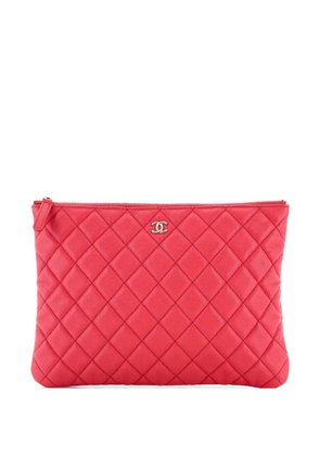 CHANEL Pre-Owned O Case Quilted Caviar Medium clutch bag - Pink