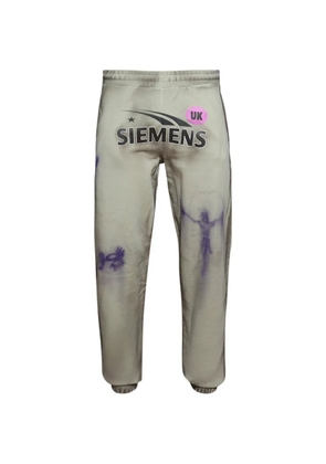 LA MASKARADE Dirty graphic-print track pants - Grey