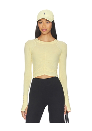 Free People x FP Movement Tempo Ruched Long Sleeve Top in Yellow. Size XS. Also in S, M, L, XL.