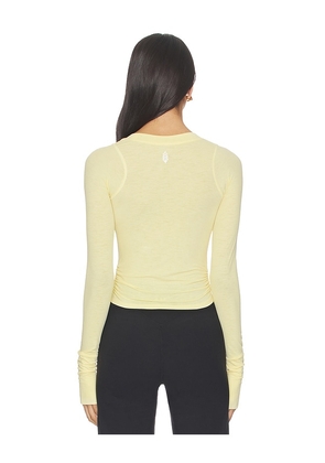 Free People x FP Movement Tempo Ruched Long Sleeve Top in Yellow. Size XS. Also in L, M, XL.