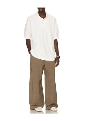 Lacoste Runway Loose Fit Boucle Knit Polo Shirt in White. Size S. Also in M.