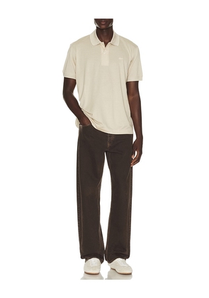 Lacoste Runway Classic Fit Silk Pique Polo Shirt in Cream. Size M. Also in L.