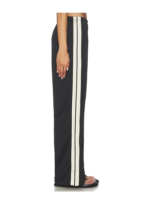 Palm Angels Classic Logo Track Loose Pant in Black. Size XS. Also in S, M, XL.