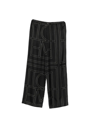 TOTEME monogram-print wide-leg trousers - Black