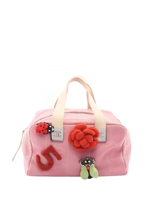 CHANEL Pre-Owned 2003-2004 CC Canvas Chocolate Bar No.5 Camellia Bowling Bag handbag - Pink