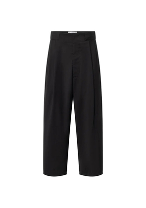 House Of The Very Islands Jonas pleated wool trousers - Black