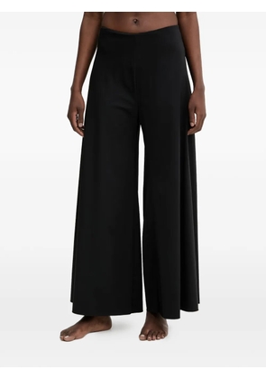 GUESS USA Gaia logo-patch palazzo pants - Black
