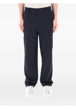 Armani Exchange seersucker-textured logo-plaque trousers - Blue