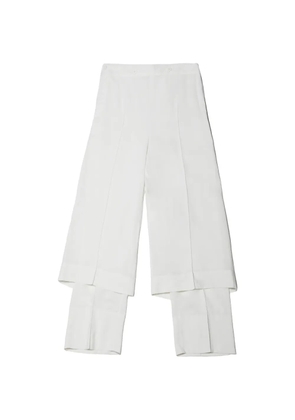 Issey Miyake Two As One layered pressed-crease trousers - White