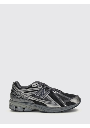 NEW BALANCE Sneakers Men color Black