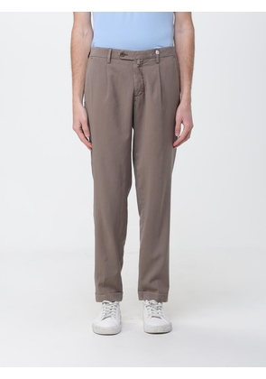 MYTHS Pants Men color Brown