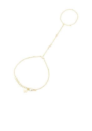 By Adina Eden Dainty Cz Bezel Hand Chain in Metallic Gold.