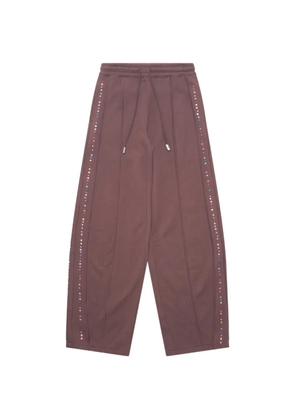 Eckhaus Latta crystal-embellished track pants - Brown
