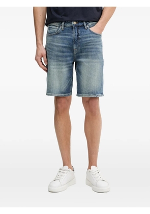 GUESS USA faded-effect denim shorts - Blue