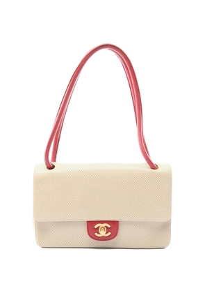 CHANEL Pre-Owned 2000-2002 Coco Mark perforated leather shoulder bag - Neutrals