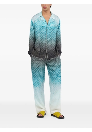Roberto Cavalli monogram-print ombré trousers - Blue