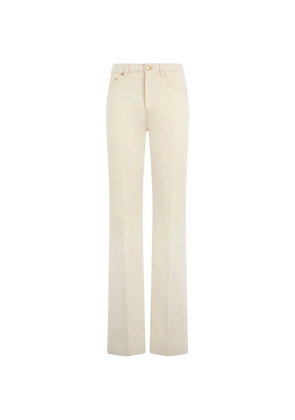 Roberto Cavalli logo-patch flared jeans - Neutrals