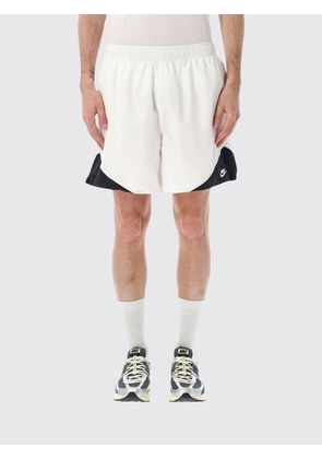 NIKE Shorts Men color White