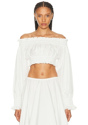 Norma Kamali Long Sleeve Peasant Cropped Top in Snow White - White. Size XS (also in S, M, L).