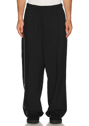 Y-3 x F1 Track Pants in Black - Black. Size M (also in S, L, XL/1X).