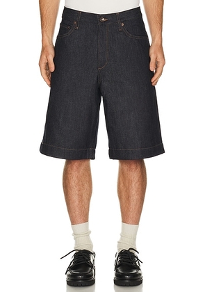 Rag & Bone Baggy Denim Short in Undone Denim - Blue. Size 30 (also in 31, 32, 33, 34).