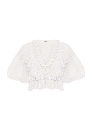Blouse with frilled short sleeves