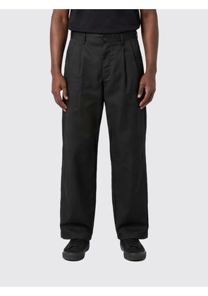 CARHARTT WIP Pants Men color Black