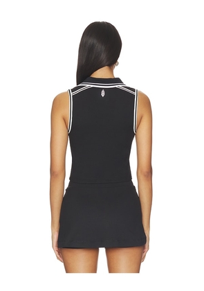 Free People x FP Movement Forehand Polo Top in Black. Size XS. Also in L, M, S, XL.