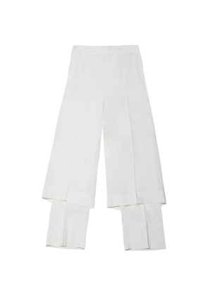 Issey Miyake Two As One layered pressed-crease trousers - White