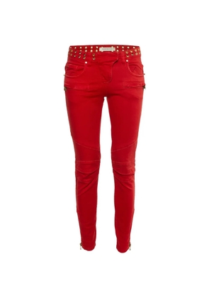 Balmain Pre-Owned Studded slim-fit jeans - Red