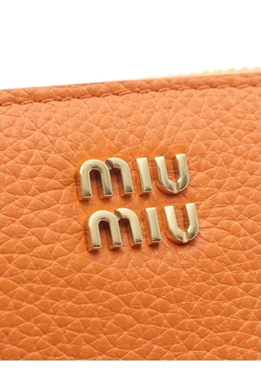 Miu Miu Pre-Owned 2010s logo-lettering leather coin purse - Orange