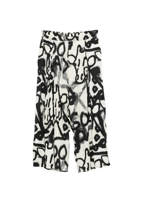 Rundholz graffiti-print trousers - White