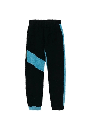 Stain Shade panelled fleece track pants - Black
