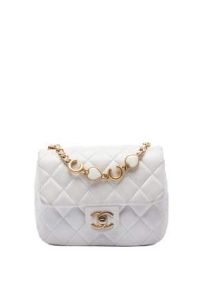 CHANEL Pre-Owned 2021-2026 Mini Square Classic Lambskin Enamel Coco Hearts Single Flap crossbody bag - White