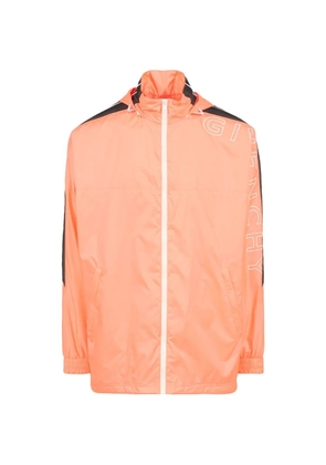 Givenchy oversized logo-print zip-up hooded windbreaker jacket - Orange