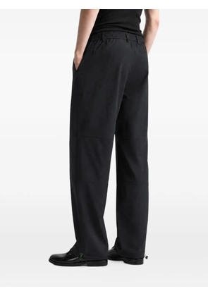 Malbon Golf logo-print track pants - Black