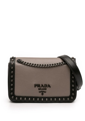 Prada Pre-Owned 2013-2026 Bicolor Glace Calfskin Studded crossbody bag - Brown