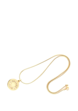 Hermès Pre-Owned 2010s logo-cutout pendant necklace - Gold