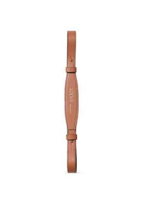 LOEWE logo-embossed leather strap - Neutrals