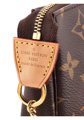 Louis Vuitton Pre-Owned Pochette Accessoires Monogram Canvas Mini clutch bag - Brown
