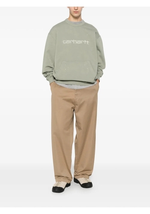 Carhartt WIP logo-print paint-splatter sweatshirt - Green