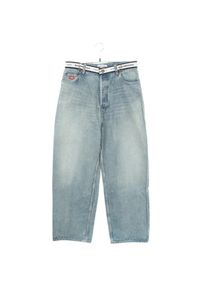 Balenciaga Pre-Owned 2010s logo-waist button-fly baggy jeans - Blue