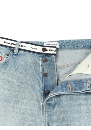 Balenciaga Pre-Owned 2010s logo-waist button-fly baggy jeans - Blue