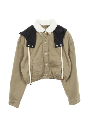 Miu Miu Pre-Owned 2010s Limestone cropped blouson jacket - Neutrals