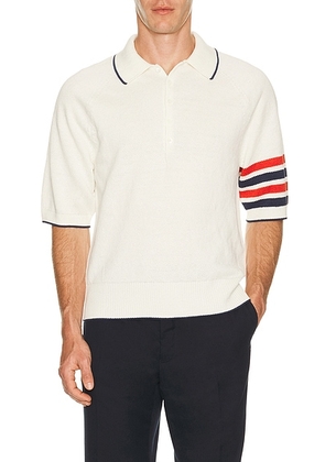 Thom Browne Relaxed Fit Raglan Short Sleeve Polo in White - White. Size 1 (also in 2, 3, 4, 5).