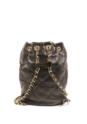CHANEL Pre-Owned CC diamond-quilted backpack - Black