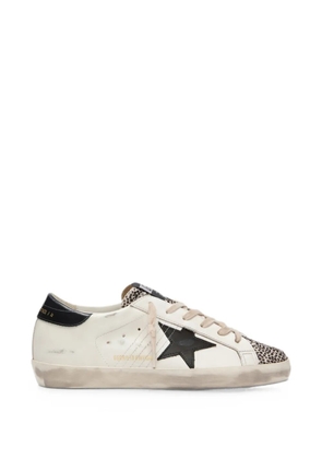 Golden Goose Super-Star LTD in white leather with black star and pony skin details sneakers