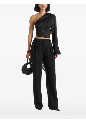 Manière De Voir Coralie in black one-sleeve and lace-wrap top