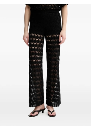 TWINSET crochet-knit logo-plaque trousers - Black